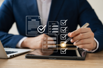 Person looking at screen of check marks